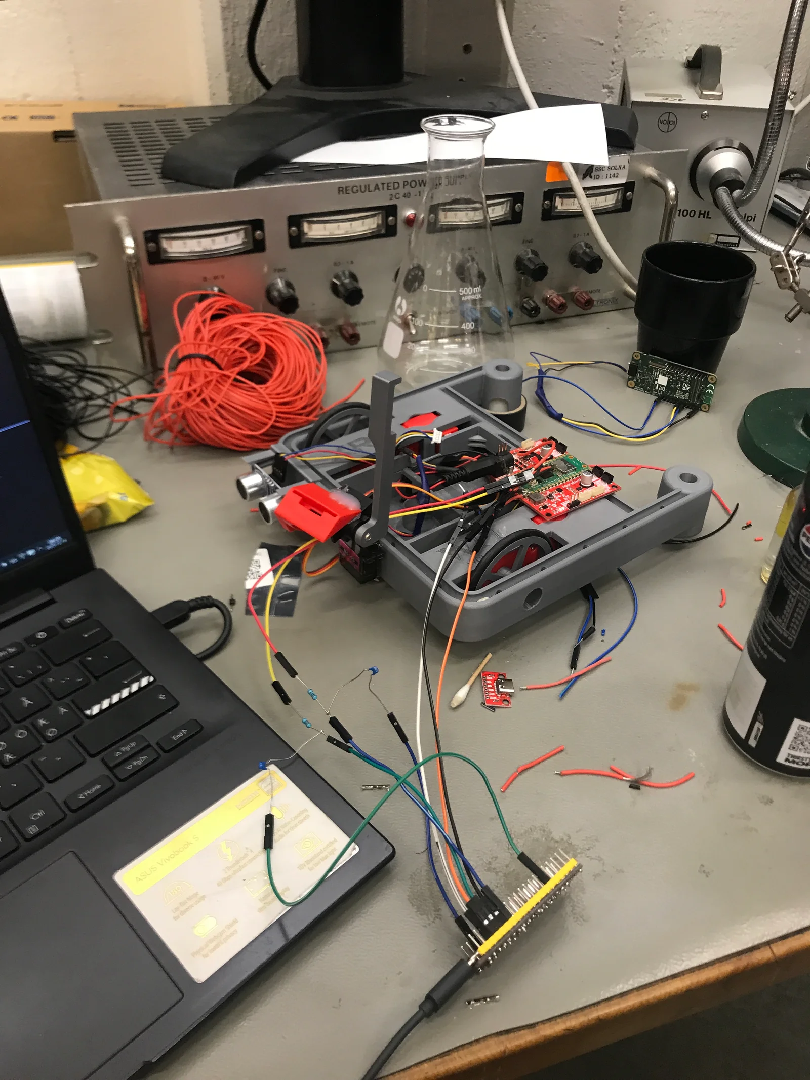 The XRP robot during bench integration, with its controller, wiring and camera mount.